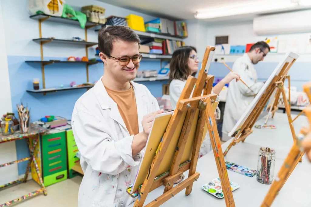 Group of disabled friends in art class